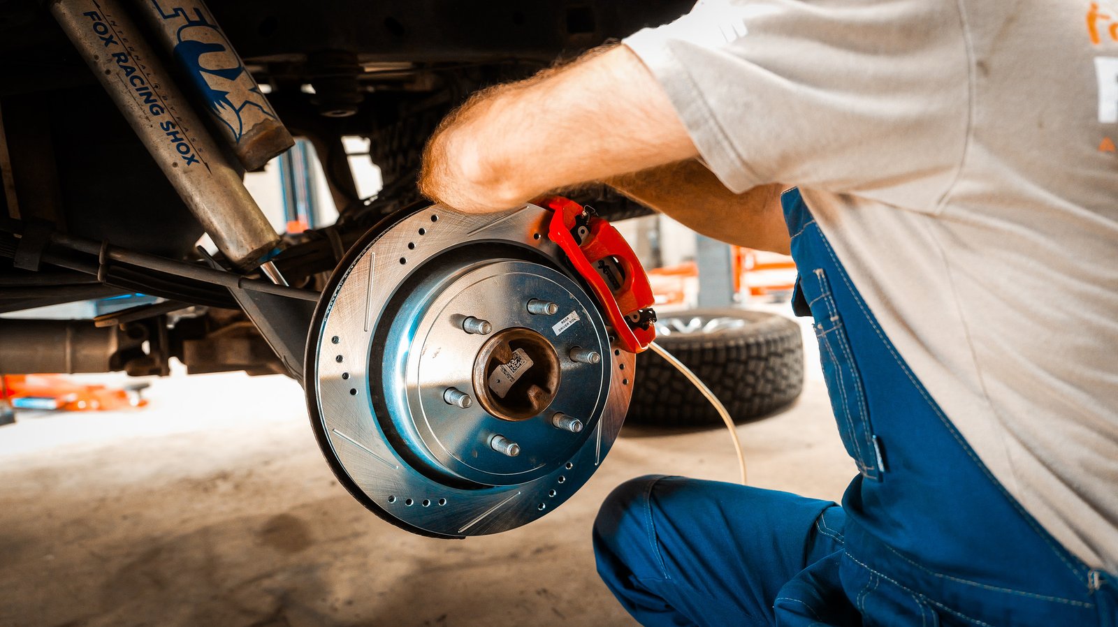 Slotted brake rotor and new caliper